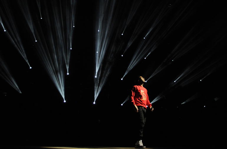 Drake walks across the stage during his Club Paradise show Friday, June 1, 2012, at Klipsch Music Center north of Indianapolis.