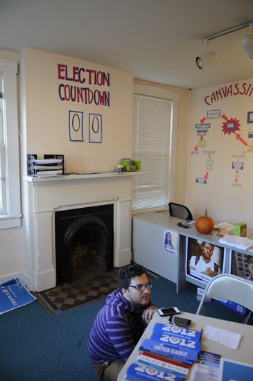 Obama local logistics captain Brian Cole sits on a field office floor on Election Day.