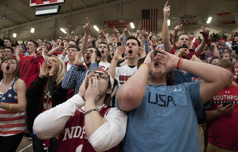 Southport fans cheer as victory nears in the Southport boys\' basketball team\'s 88-80 victory over Evansville Reitz at Southport High School, Saturday, Feb. 28, 2015.