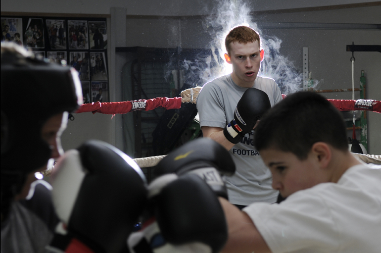 After Guatemala, I started another new thing: six weeks as a staff photographer at the Journal & Courier in Lafayette, Ind. It was my first stint in daily photojournalism since college, and I thoroughly enjoyed it. // Lafayette Boxing Club\'s Tate Sturgeon watches as Kate Mane and Kyle Siple trade light jabs during a workout Tuesday, March 5, 2013, at the club building in Lafayette.