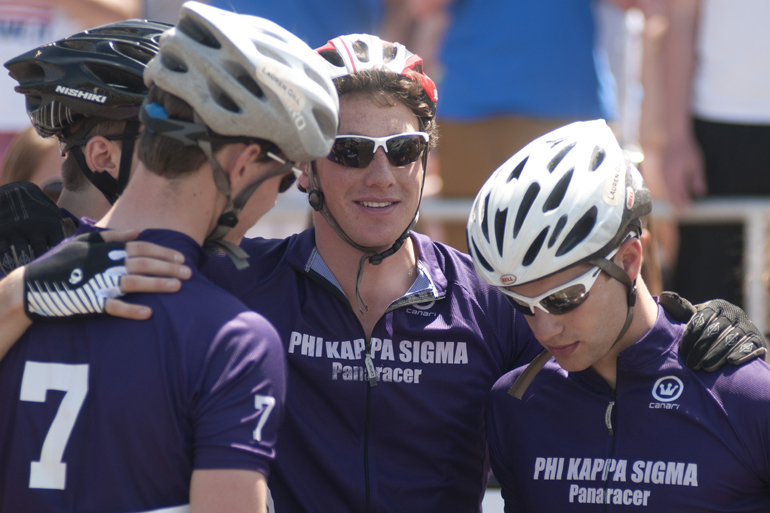 Phi Kappa Sigma riders huddle before the men\'s Little 500 at Bill Armstrong Stadium in Bloomington, Saturday, April 26, 2014.