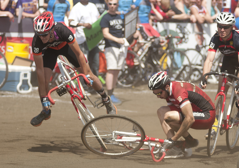 Riders from Collins (28), Dodds House (16) and Delta Upsilon (23) are involved in an accident going into turn three during the men\'s Little 500 at Bill Armstrong Stadium in Bloomington, Saturday, April 26, 2014.