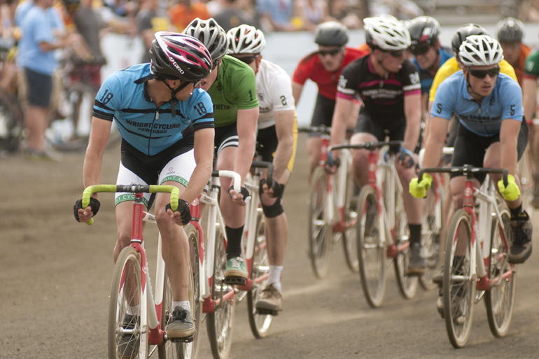 A rider from Wright looks back to the lead pack during the men\'s Little 500 at Bill Armstrong Stadium in Bloomington, Saturday, April 26, 2014.