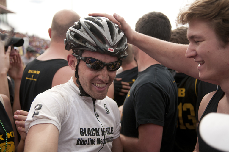 Black Key Bulls rider Spencer Brauchla gets congratulated after his team won the men\'s Little 500 at Bill Armstrong Stadium in Bloomington, Saturday, April 26, 2014.