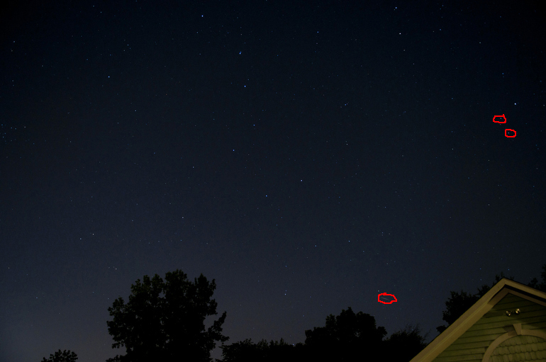 Three Camelopardalids meteors, marked