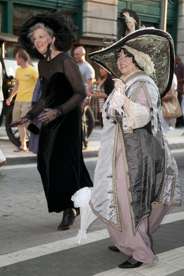 Deborah Magga and Terri Louk dance to music from the Great American Songbook during the Omni Severin Hotel\'s 100th anniversary party on Georgia Street, Friday, August 23, 2013.