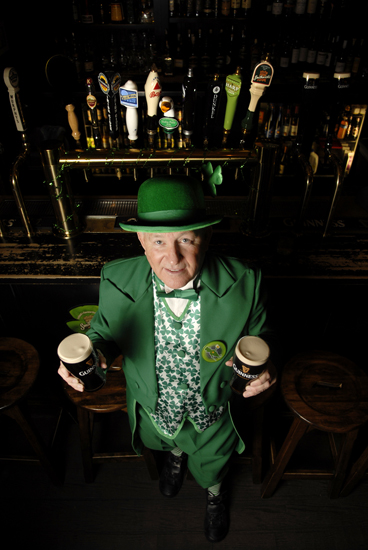 Nine Irish Brothers owner Jerry O\'Bryan stands ready for St. Patrick\'s Day, on Wednesday, March 13, 2013, at his bar in Lafayette.