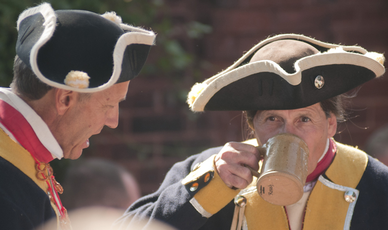Brunswickers Jon Andrews and Doug Roush talk during GermanFest at the Athenaeum in Indianapolis, Saturday, Oct. 12, 2013. Roush is a unit commander in Regiment von Riesdesel.