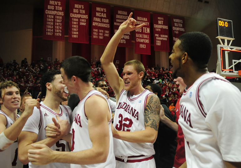 Sophomore forward Derek Elston (32) and other Indiana University players celebrate after their 52-49 victory over Illinois on Jan. 27, 2011, at Assembly Hall in Bloomington, Ind.