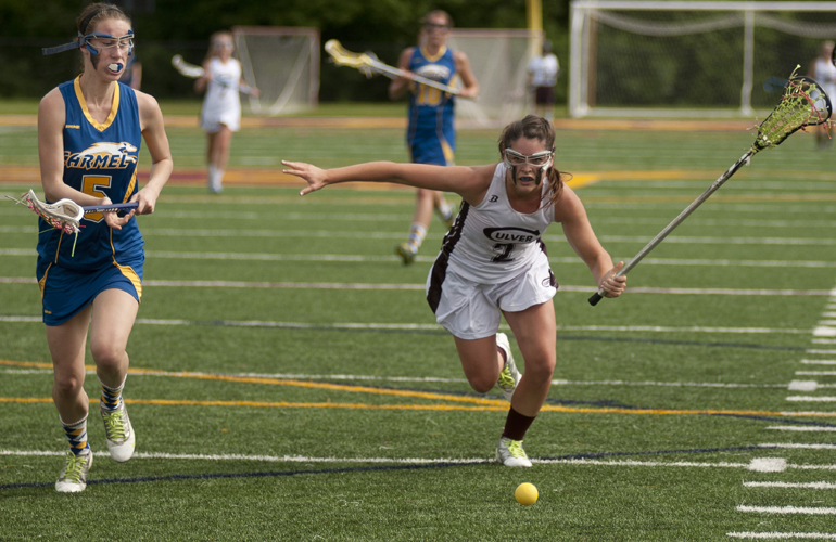 Culver attacker Olivia Rabbitt (right) tries to keep a loose ball away from Carmel defender Brittany Dudley during Culver\'s 9-8 victory over Carmel in the Indiana Girls Lacrosse Association state championship at Brebeuf Jesuit Preparatory School in Indianapolis, Saturday, June 1, 2013.