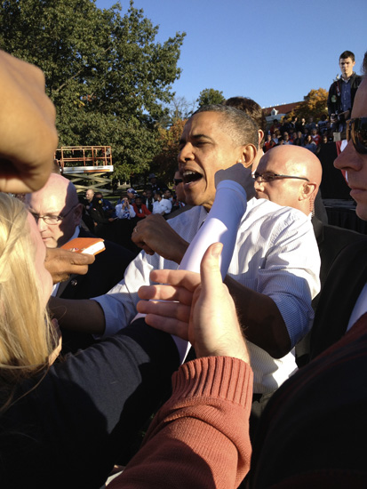 U.S. President Barack Obama shakes hands with supporters after his stump speech at the Ohio State University in Columbus, Ohio.