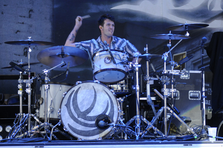 Eli Young Band drummer Chris Thompson performs during the group's performance on Friday, Aug. 31, at Klipsch Music Center in Noblesville.
