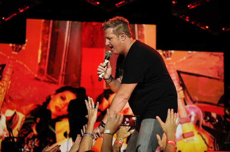 Rascal Flatts vocalist Gary LeVox greets fans during the trio's performance on Friday, Aug. 31, at Klipsch Music Center in Noblesville.