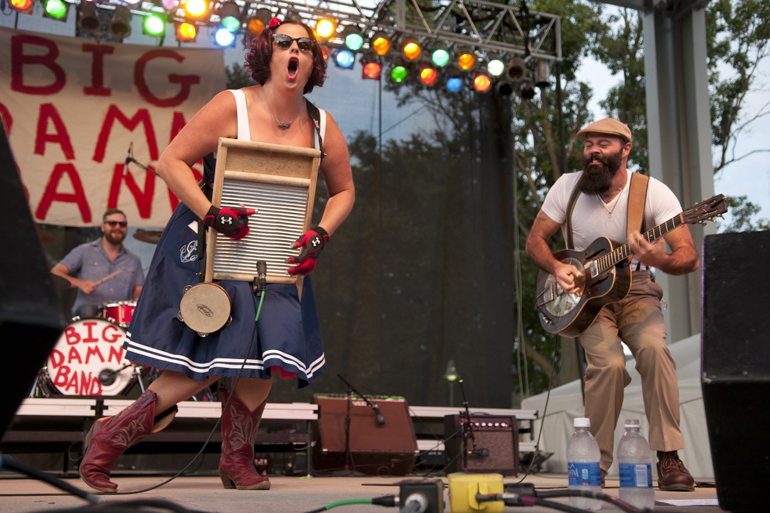 Breezy Peyton, The Rev. J. Peyton\'s wife, plays the washboard during The Reverend Peyton\'s Big Damn Band\'s performance on Hoosier Night on the Marsh Free Stage at the Indiana State Fair, Friday, August 16, 2013.
