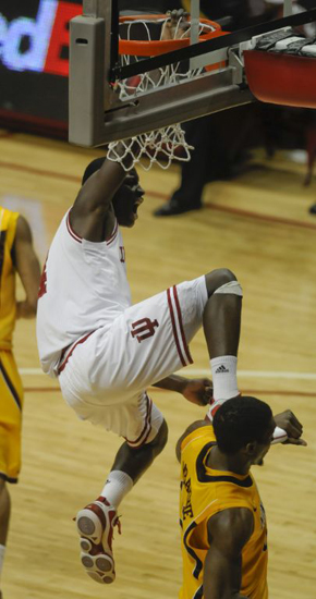 Indiana University guard Victor Oladipo dunks over (and accidentally kicks) University of Minnesota forward Trevor Mbakwe during a 60-57 victory over the Golden Gophers on Feb. 2, 2011.