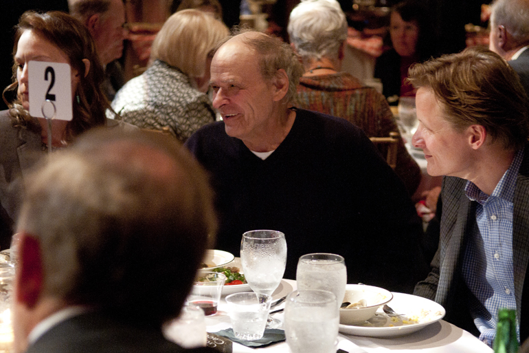 Pulitzer Prize-finalist author Tim O\'Brien talks with fellow dinner guests at VonnegutFest\'s Timequake Clambake at Indiana Landmarks\' Cook Theater, Saturday, Nov. 9, 2013.