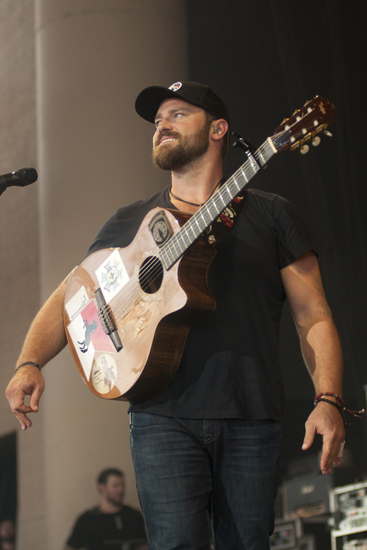 Zac Brown Band lead vocalist and guitarist Zac Brown looks toward the crowd during a performance at Klipsch Music Center, Sunday, July 13, 2014.